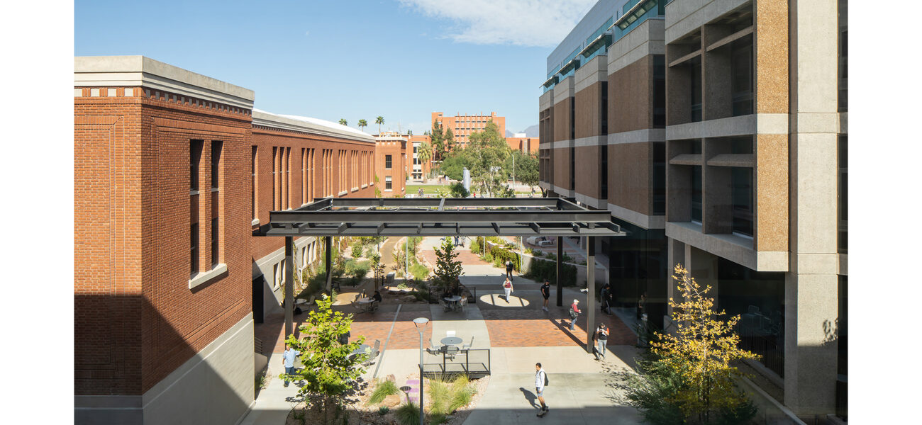 Outdoor space between Bear Down Gymnasium (left) and Main Library (right)