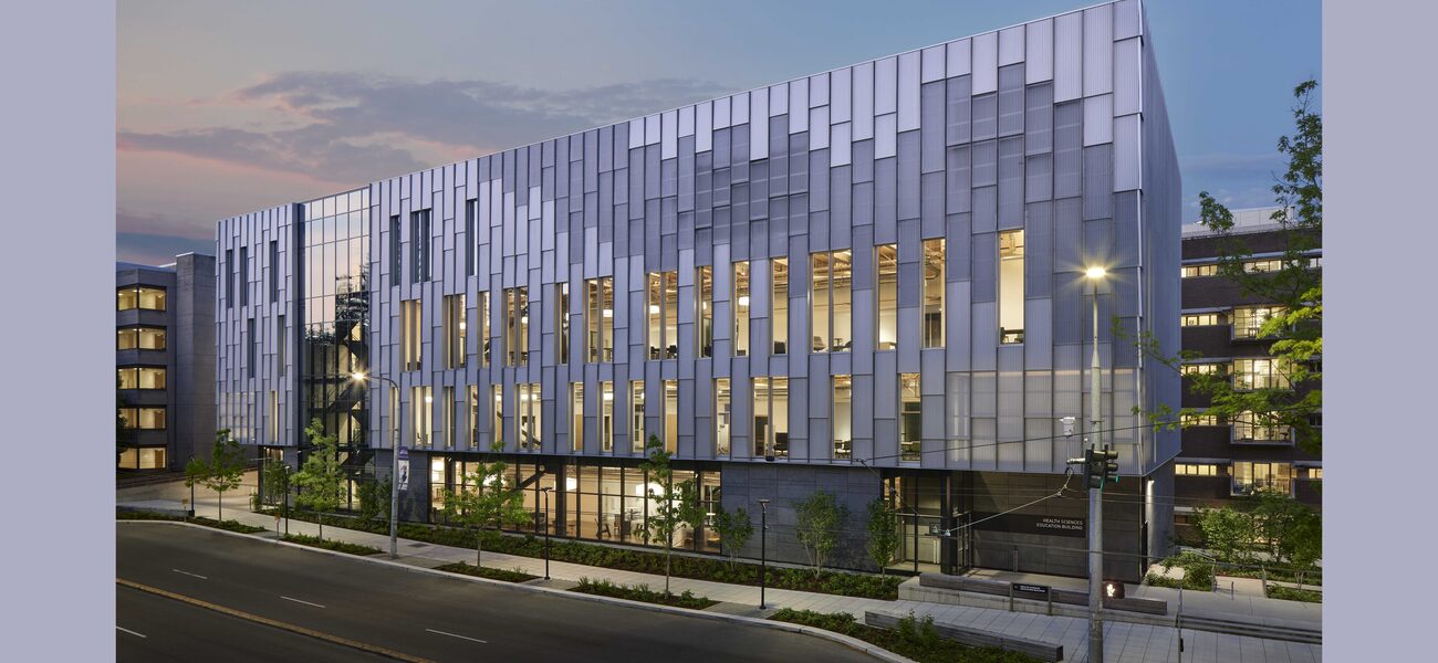 Large glass structure with vertical windows