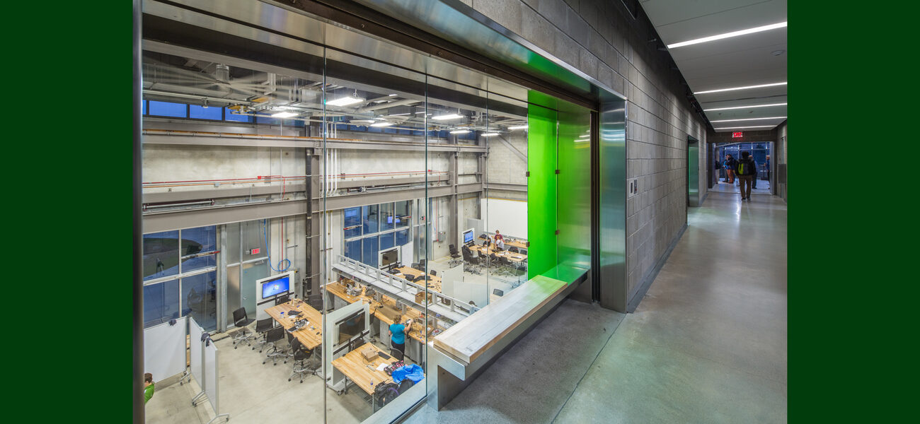 Work benches and electronic equipment as seen fro above, showing how high the ceiling is.