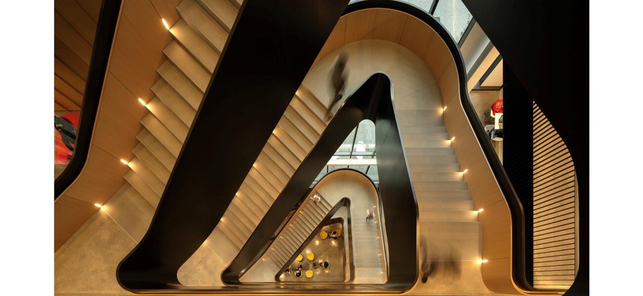 Triangular staircase winds up multiple floors