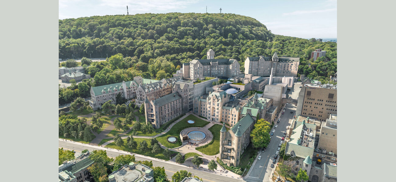 Aerial view of a campus of old stone buildings