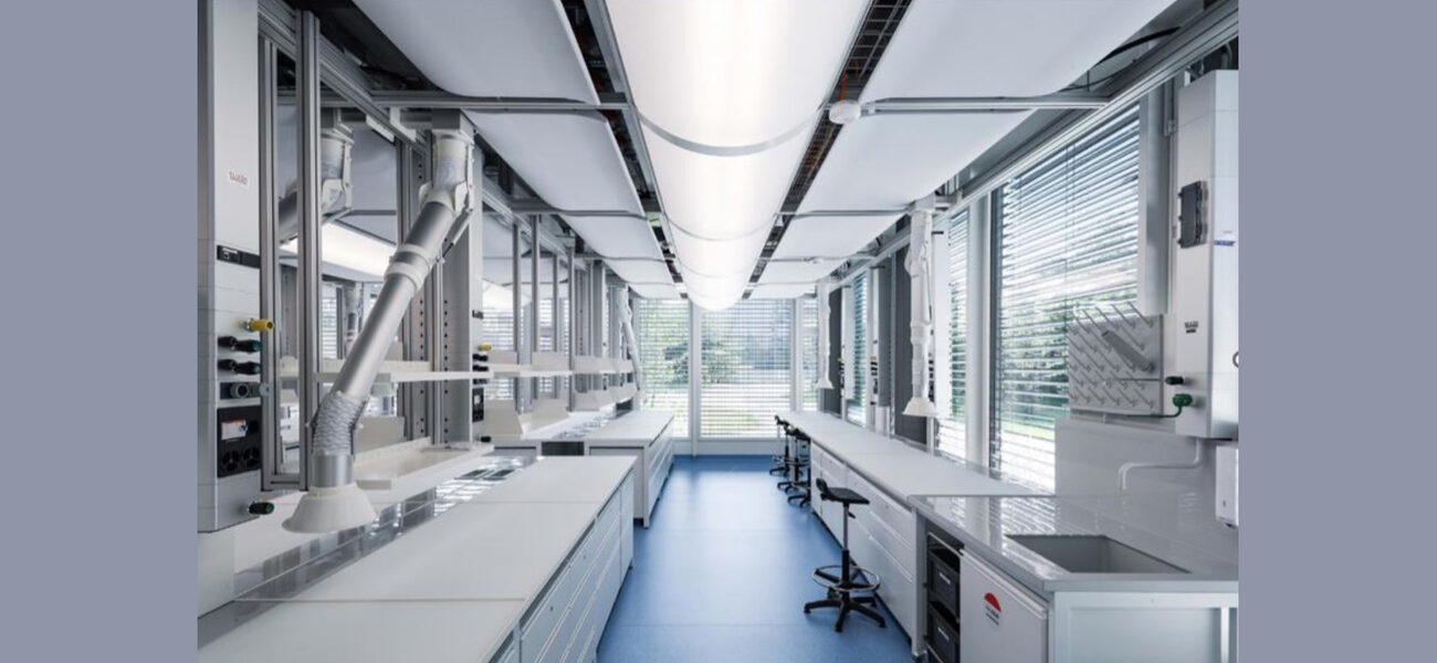 A laboratory with a large mechanical unit on the ceiling