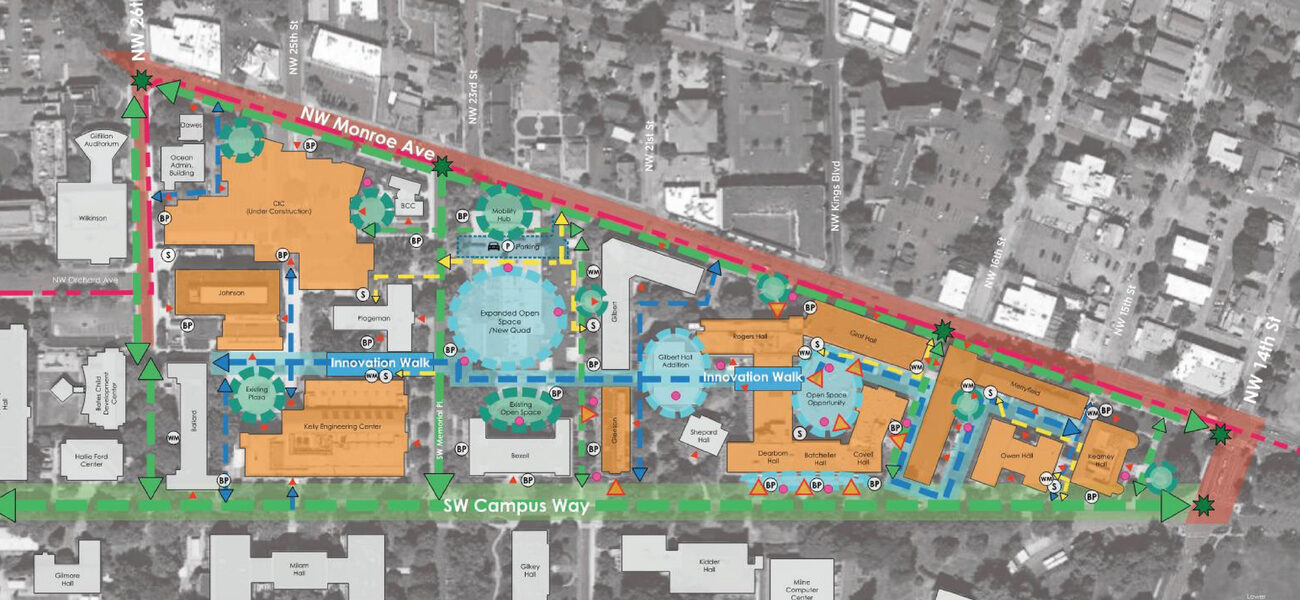 Map showing a number of buildings inside a triangle-shaped area bordered by three roads.