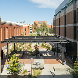 Outdoor space between Bear Down Gymnasium (left) and Main Library (right)