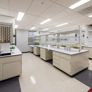 A large room with mutliple lab benches