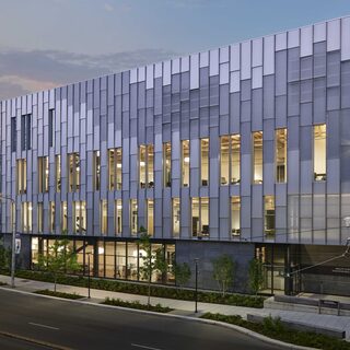 Large glass structure with vertical windows