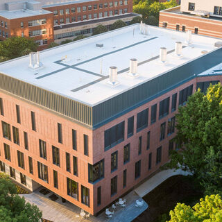Aerial view of a b uilding constructed mostly of brick