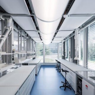 A laboratory with a large mechanical unit on the ceiling