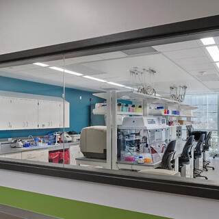 A long window looking into a lab