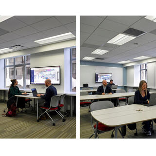 Men and women sitting at different-sized tables, working on their laptops.